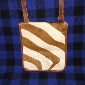 Made in the USA genuine animal print and hide.